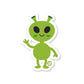 A die-cut vinyl sticker of a cute green alien with a friendly expression, standing upright.