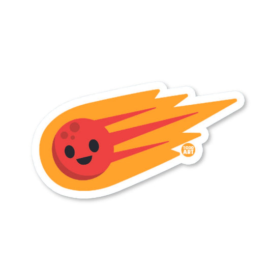 A die-cut vinyl sticker of a cartoon comet with a smiling face and orange tail.