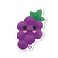 A die-cut vinyl sticker of a cute grape character with a smiling face, designed in shades of purple and green with a white outline.